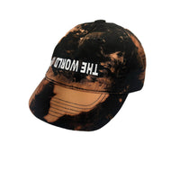 THE WORLD IS UPSIDE DOWN cap
