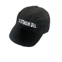 THE WORLD IS UPSIDE DOWN cap